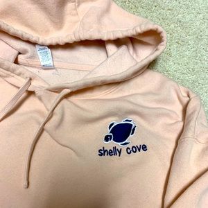 cropped light pink hoodie